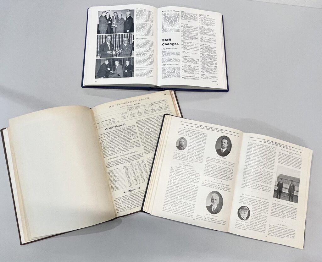 3 volumes of railway company staff magazines open at staff information pages