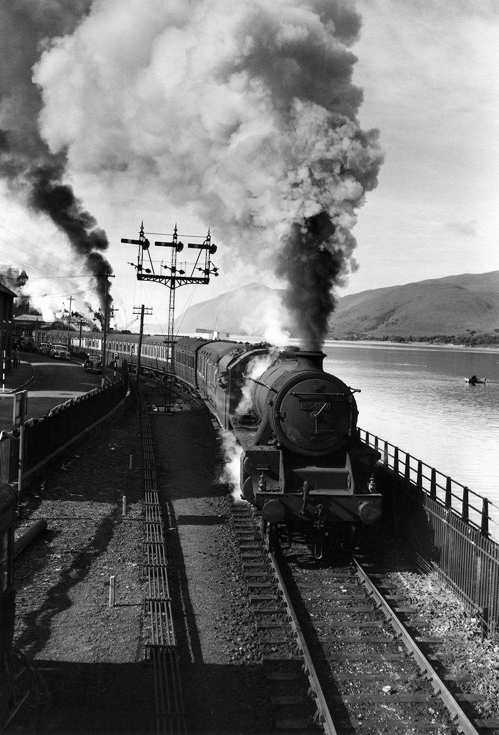 Class 5 steam locomotive No 45499 on the banks of Loch Linnhe, near Fort William heading for Glasgow, c 1950s.