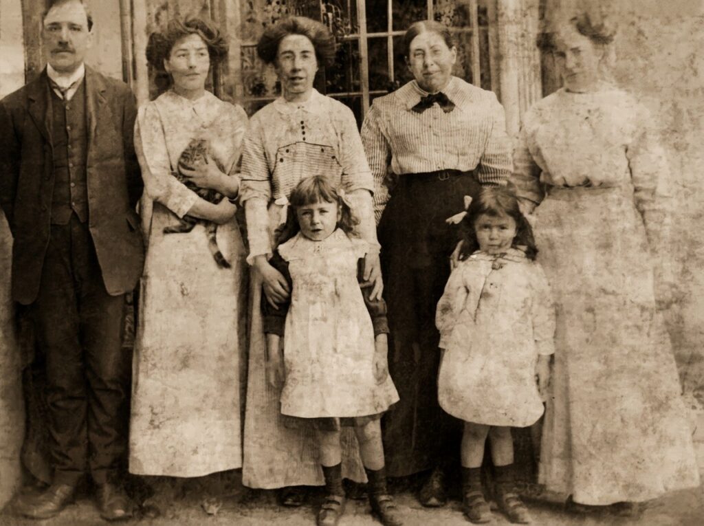 A picture of the Danby family: Ethel Danby in the centre, Harry on the left, and daughters Nellie and Vi as well as Ethel's sisters and mother.